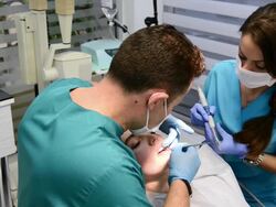 Young woman getting a dental filling Stock Footage