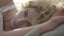 Sad Woman Lying In Bed Stock Footage