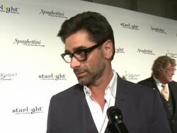 INTERVIEW - John Stamos at 2014 Starlight Awards Stock Footage