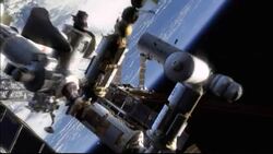 An astronaut floats outside a space station. Stock Footage