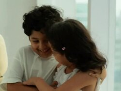 Boy and girl playing  Stock Footage