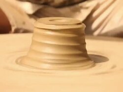 Man making a earthen pot on a pottery wheel, Faridabad, Haryana, India Stock Footage