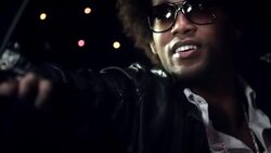 Hip-hop star in limousine gives peace sign to paparazzi at awards show Stock Footage