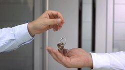 HD: Realtor Handing Keys Stock Footage