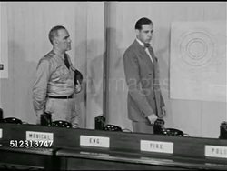 1951: EMERGENCY PREPAREDNESS: DRAMATIZATION: 'City official' explaining Operations table to 'Colonel', plan is for officials who normally run area to be in charge here. Civil Defense Plan, The Red Scare, McCarthyism. Instructional Video