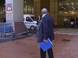 Camilla Parker-Bowles walks through airport as ordinary passenger Stock Footage