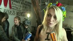 CLEAN: Feminist Femen group goes topless in Paris News Clip