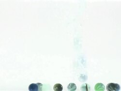 MS Marble balls falling into an aquarium / Sao Paulo, Brazil Stock Footage