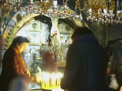MS T/L Shot of religious worshiping at Holy Sepulchre interior / Jerusalem, Judea, Israel Stock Footage