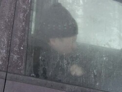 A blizzard traps a man in an SUV. Stock Footage