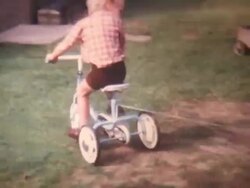 Boy on Tricycle Super 8 1972 (HD1080) Stock Footage