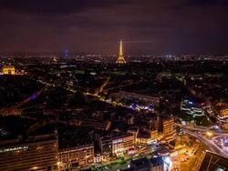 High view on Arc de Triomphe and Eiffel Tower at night tilt Stock Footage