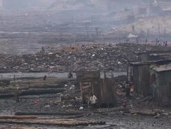 MS Village with logs, trashes and smoke / Lagos, Nigeria Stock Footage