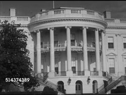 1952: WASHINGTON, D.C.: Angled WS White House & South portico w/ single guard standing on lawn, MS South Portico. MS PAN Empty chiars at Cabinet Room table, WS Cabinet Room, Door closing. Instructional Video