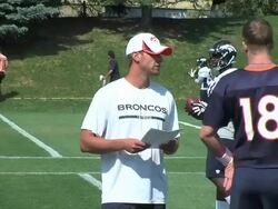 Broncos coordinator Adam Gase and Peyton Manning Stock Footage