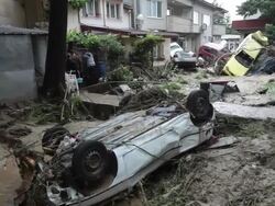 Smashed and overturned vehicles after the devastating flooding in Varna, Bulgaria Stock Footage