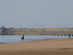 BRIDLINGTON NORTH BEACH HARBOUR WALL AND LIGHTHOUSE Stock Footage