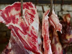 CU Shot of Meat hanging from hook in slaughter house in Namchee Bazarre / Namche, Nepal Stock Footage