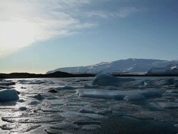 WS Many melting glaciers floating in jokulsarlon lake at sunset / Iceland Stock Footage