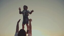 SLO MO Father lifting his son up Stock Footage