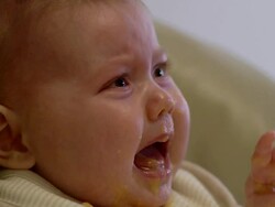 ECU Baby crying during feeding / Ann Arbor, Michigan, United States Stock Footage