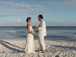 Couple getting married on the beach Stock Footage