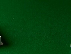 Poker chips being thrown onto table Stock Footage