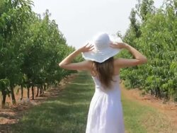 HD Young woman walking at garden Stock Footage