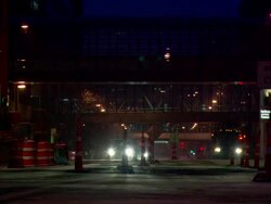 MS Empty cross bridge and cars crossing frontiers with glints at night / Minneapolis, Minnesota, Nigeria Stock Footage
