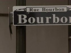 Tilt up to Bourbon street sign. Stock Footage
