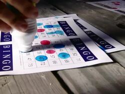 A bingo card with some punched numbers Stock Footage