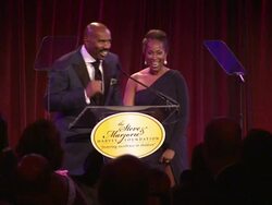 SPEECH: Steve Harvey on his wife Marjorie Harvey (standing next to him) introducing him to philanthropy at  Steve Harvey Hosts the Screen Gems Presents The Steve and Marjorie Harvey Foundation Gala in NY Stock Footage