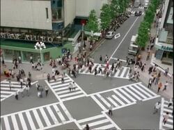 High WA view of pedestrians at city crossroads, Shibuya, Tokyo, Japan Stock Footage