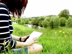 Digital tablet woman, outdoors in beautiful location. Stock Footage