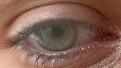 ECU Watery blue eye Stock Footage