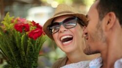Cute Brazilian couple take selfie photo as they kiss Stock Footage
