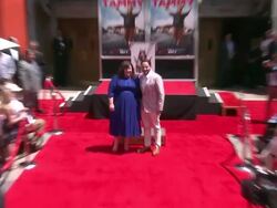 Melissa McCarthy and Ben Falcone pose with the new imprints of Melissa McCarthy in Hollywood Stock Footage