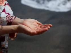 Japanese woman, origami and approaching wave Stock Footage