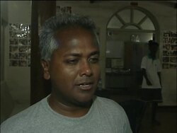 Relatives light oil lamps where train hit by tsunami News Clip