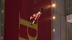 Performers dressed in Gucci suits and dresses strutted their stuff on a vertical runway in the middle of Tokyo's shopping district Wednesday evening, giving new meaning to high fashion. (May 7) Instructional Video