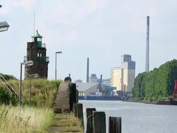 Industrial port with lighthouse in Bremen Stock Footage