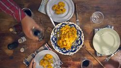 Fresh Homemade Gnocchi with Pumpkin Sauce and Chili Pepper Stock Footage