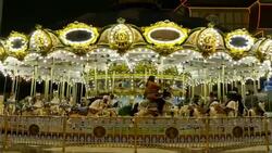 Carousel at amusement park Stock Footage