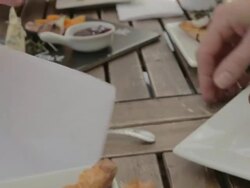 Friends eating appetizers at restaurant table Stock Footage