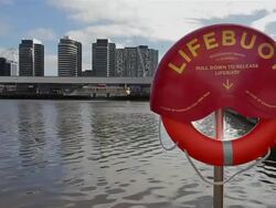 MS Shot of Lifebuoy at waterside at Docklands / Melbourne, Victoria, Australia Stock Footage