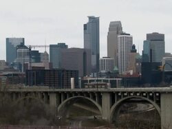 The skyline of Minneapolis Minnesota as seen from across the Mississippi River from the University of Minnesota Stock Footage