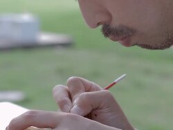 CU TD Shot of Artist making Matryoshka doll at the park / Nerima, Tokyo, Japan Stock Footage