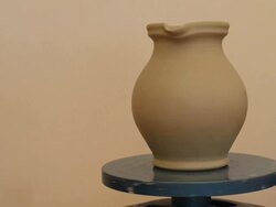 MS Shot of finishing pitcher on potterwheel at pottery / Landshut, Bavaria, Germany Stock Footage