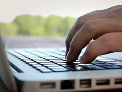 CU Man hands typing on laptop / Portland, ME, United States Stock Footage