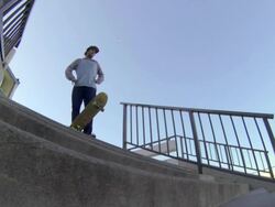 A skateboarder jumping a staircase. Stock Footage